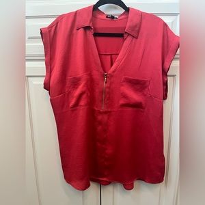 Express red blouse with gold zipper